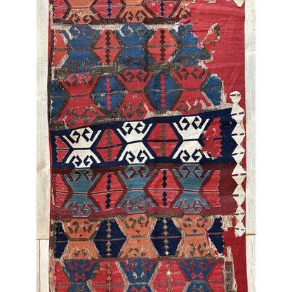 Antique Anatolian kilim fragment with geometric hexagon patterns in madder red indigo and ivory