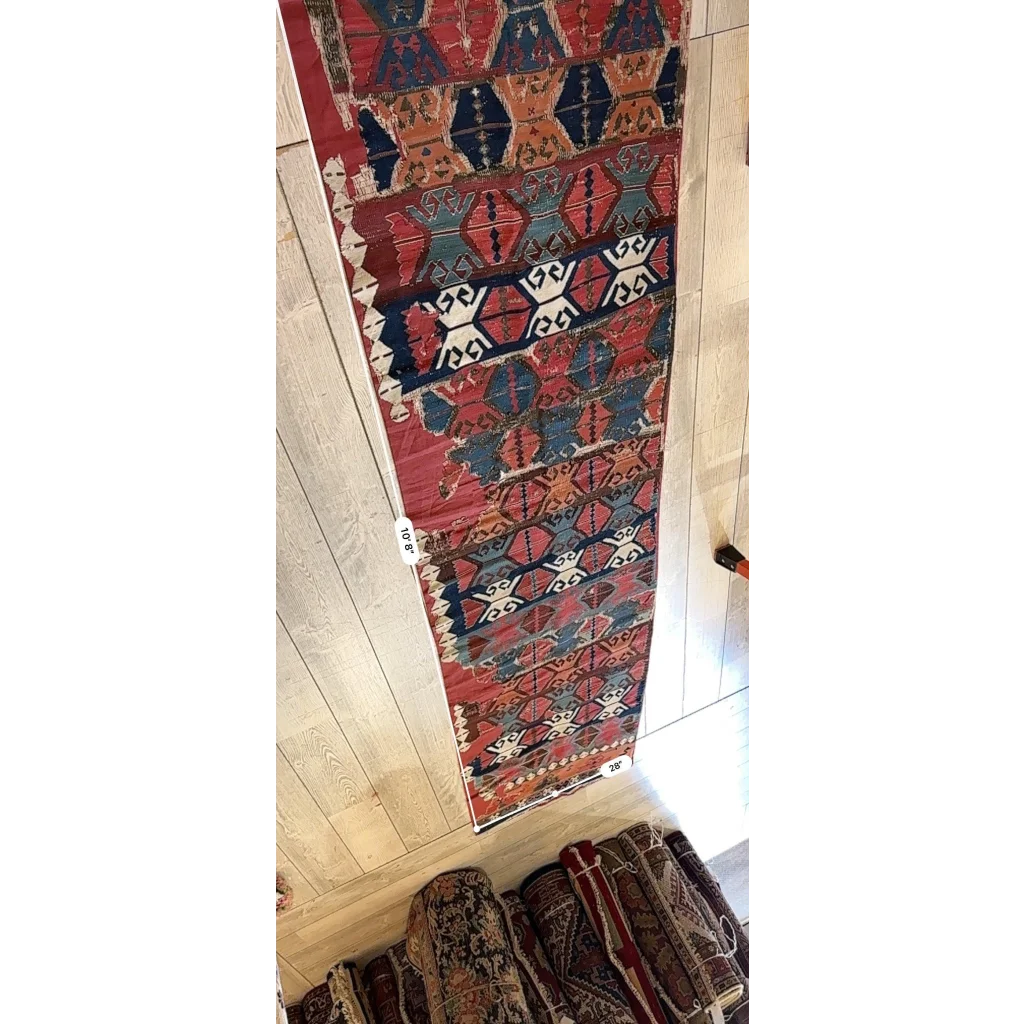 Rare 19th century Anatolian hand-woven kilim fragment in madder red