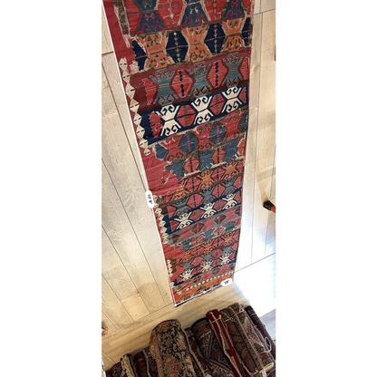 Rare 19th century Anatolian hand-woven kilim fragment in madder red