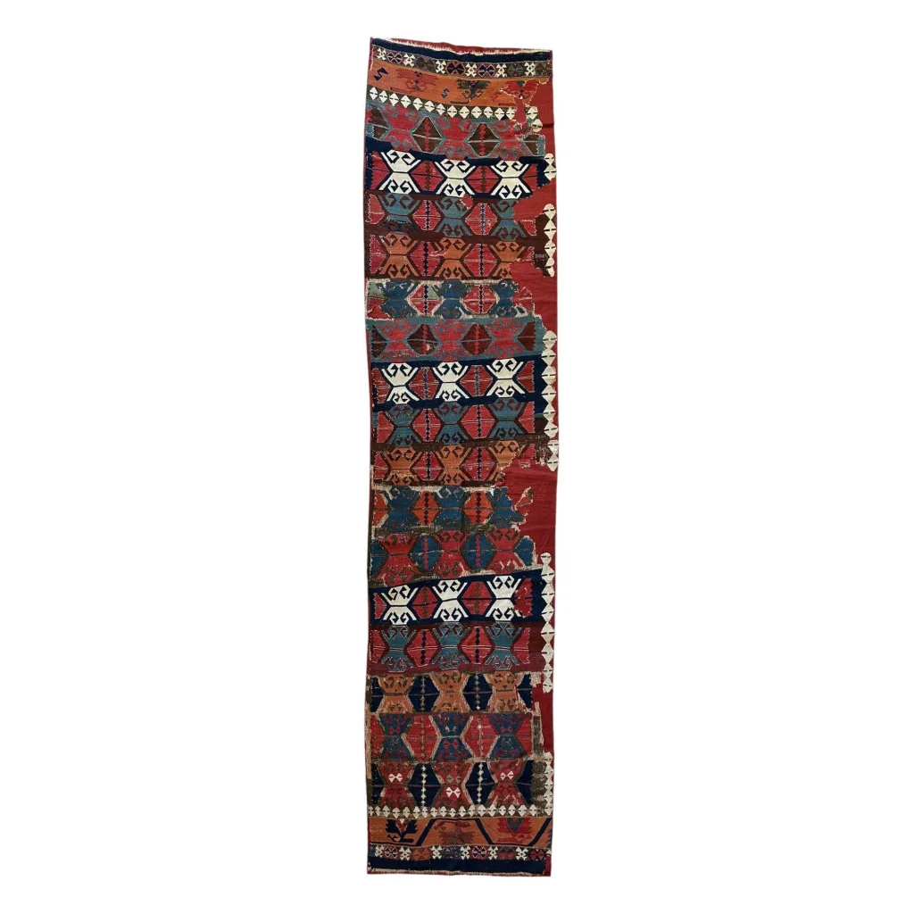 Antique 19th century Anatolian kilim fragment in madder red, full view, tribal hexagon and hook motif