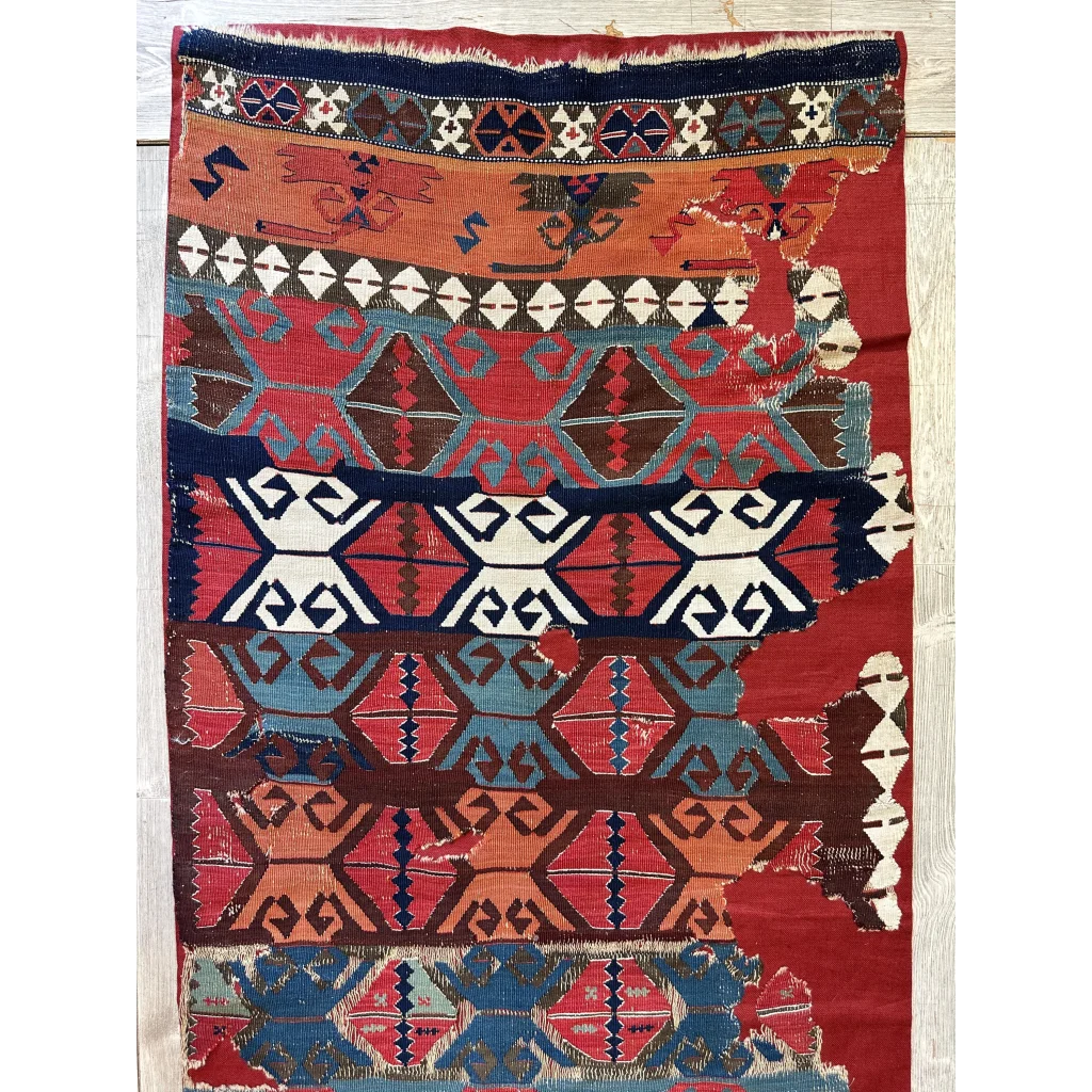 Anatolian kilim fragment 19th century, vibrant madder red and indigo hand-spun wool, tribal motifs