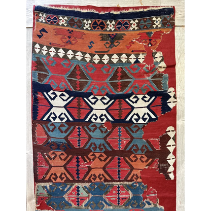 Anatolian kilim fragment 19th century, vibrant madder red and indigo hand-spun wool, tribal motifs