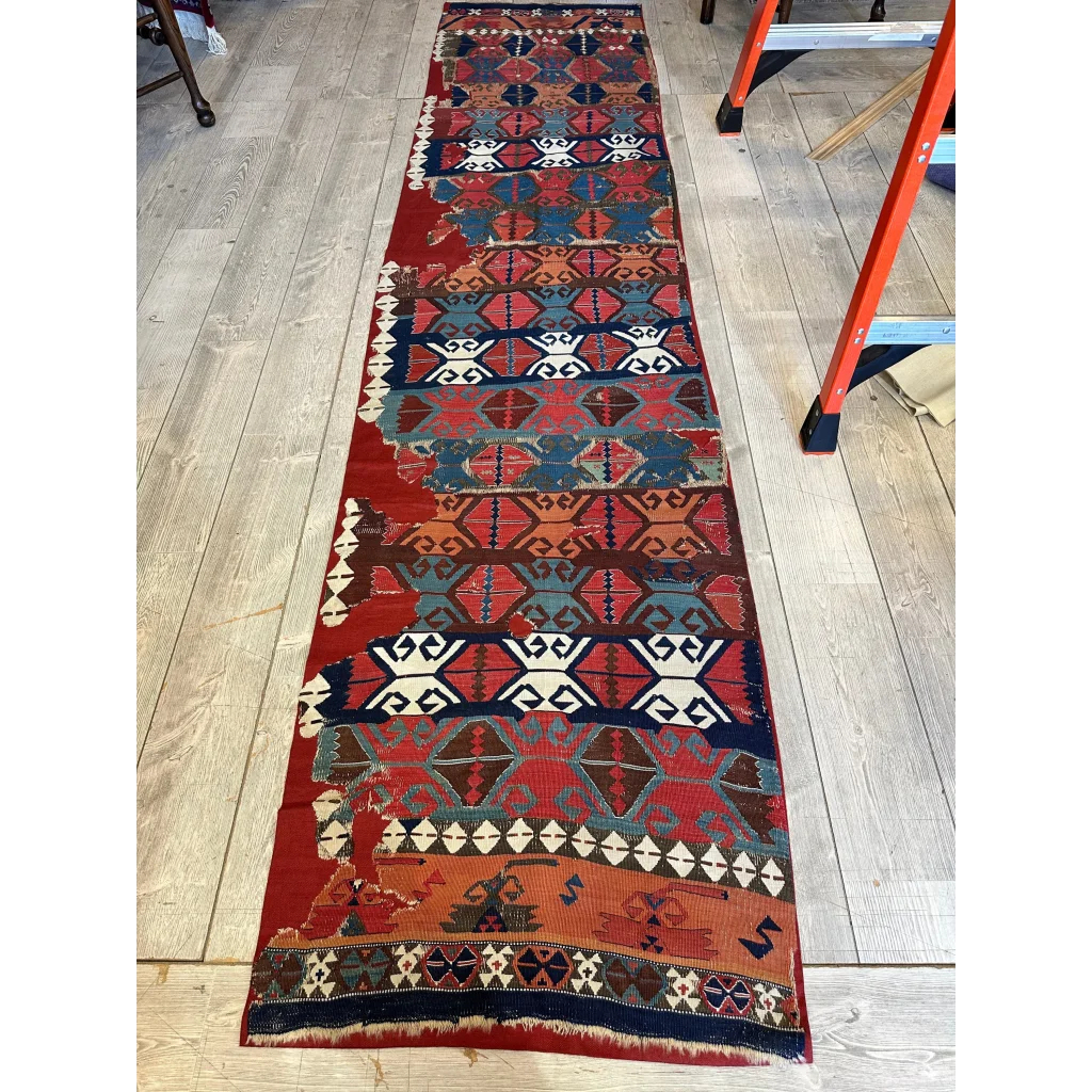 19th century Anatolian hand-woven kilim fragment, madder red and indigo geometric tribal pattern