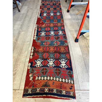 19th century Anatolian hand-woven kilim fragment, madder red and indigo geometric tribal pattern