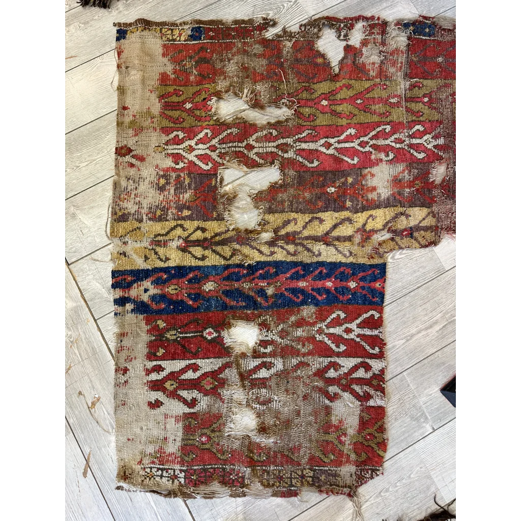 19th century Anatolian rug fragment, madder red olive gold and indigo, vine band motifs, natural dyes