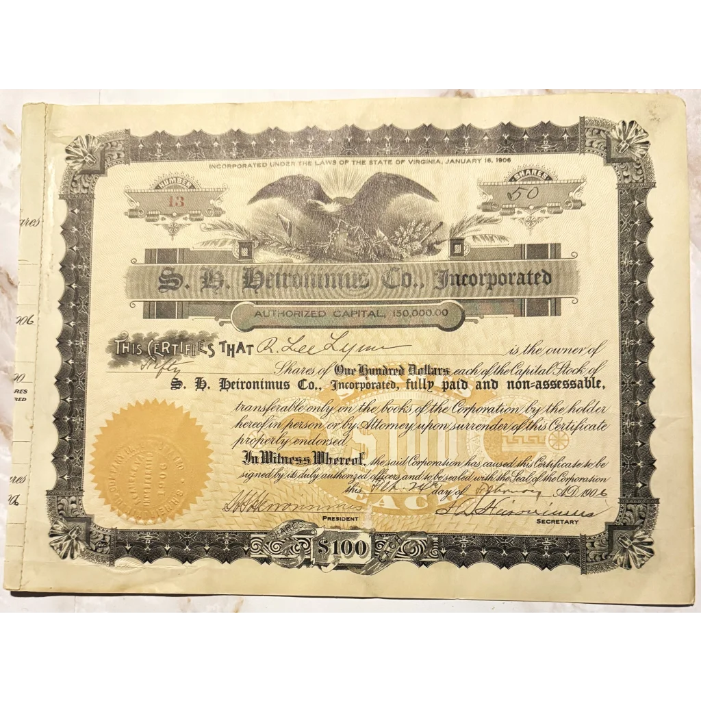 Vintage Heironimus stock certificate featuring an eagle and ornate border design