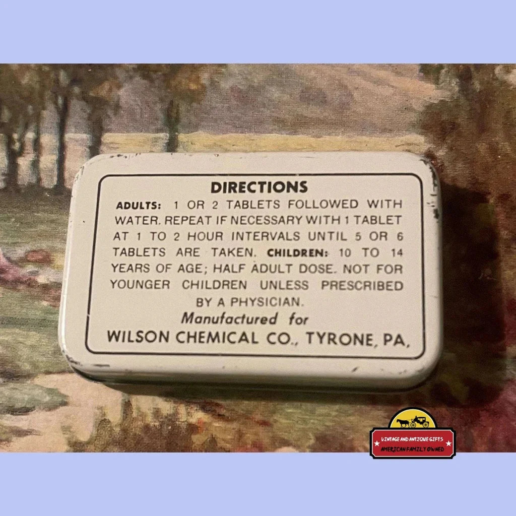 Vintage medicine label on a Cloverine Aspirin tin from Wilson Chemical Co