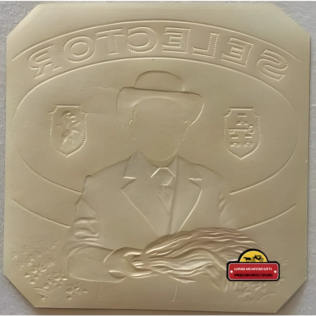 Embossed white chocolate square with a cool cigar label design featuring a hat silhouette