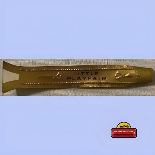 Golden metal bottle opener engraved with PLAYFAIR, perfect for cigar band collectors