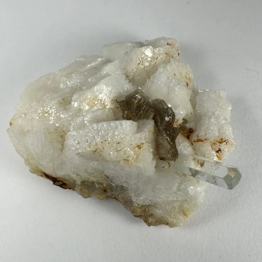 Rare translucent white quartz cluster with clear point and brown inclusions from Shigar Valley, Pakistan