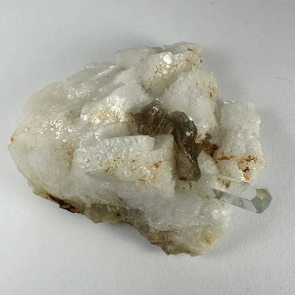 Rare translucent white quartz cluster with clear point and brown inclusions from Shigar Valley, Pakistan