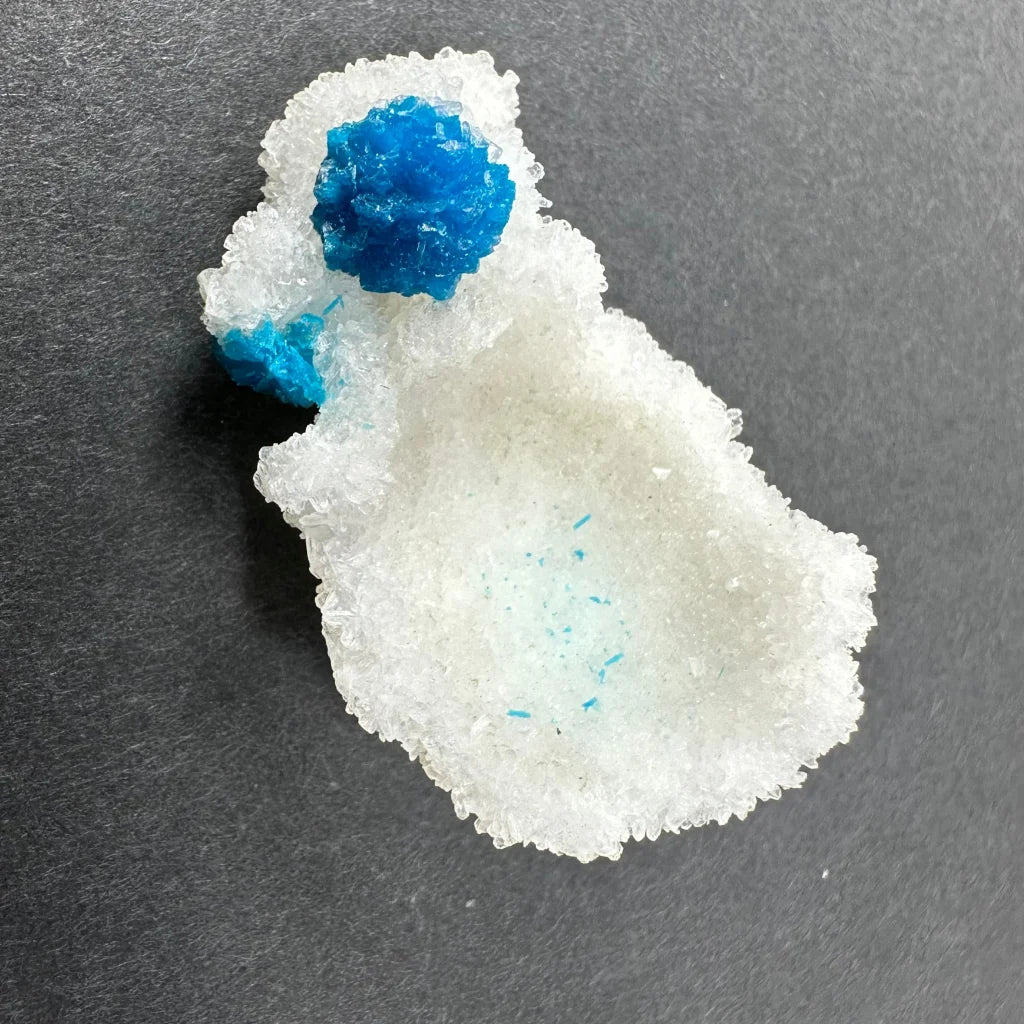 Rare Blue Cavansite Crystal Cluster from India with vibrant blue atop translucent crystals