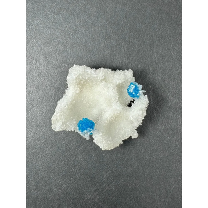Rare blue Cavansite crystal cluster from India with white crystalline mineral and bright blue inclusions