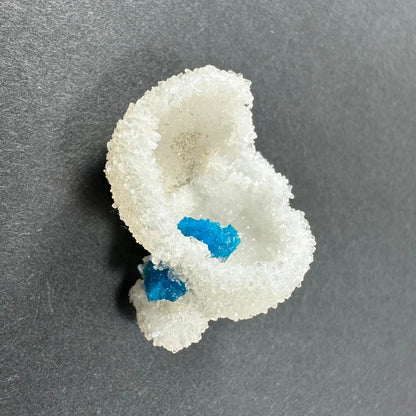 Rare blue cavansite crystal cluster with white rock and blue inclusions from India
