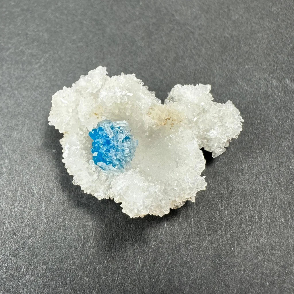 Rare blue Cavansite crystal cluster from India with vibrant core