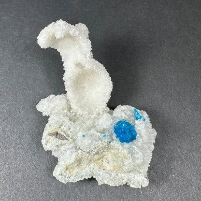 Rare blue Cavansite crystal on white stilbite from India