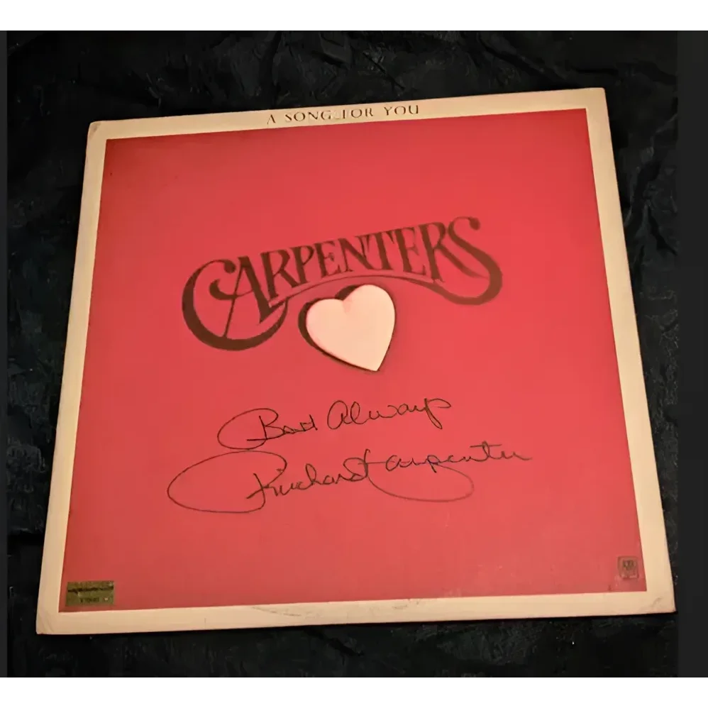 Red Carpenters record album with white heart and signature, autographed by Richard Carpenter