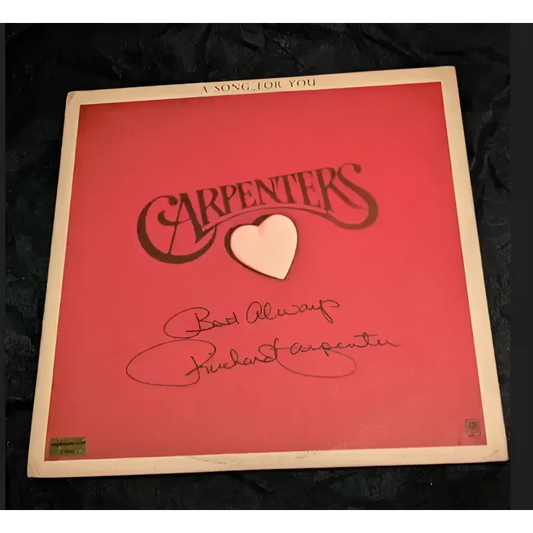 Red Carpenters record album with white heart and signature, autographed by Richard Carpenter
