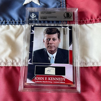A framed custom trading card featuring a rare JFK handwritten word and kennedy autograph from United States president