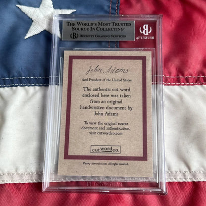 Beckett-graded collectible featuring a cut word from a John Adams legal document