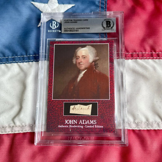 A graded John Adams trading card with his portrait and authentic Adams handwriting