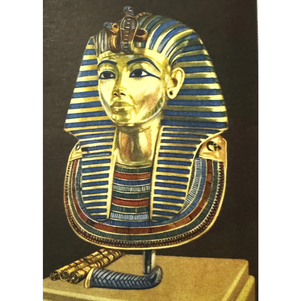 Golden funerary mask with blue and gold stripes in King Tut Vintage Postcard Collection