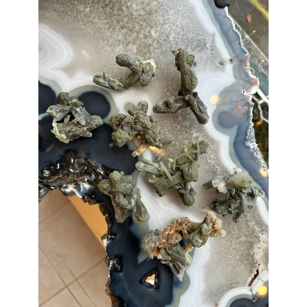 Rare marshy stilbite cluster from India on agate slab