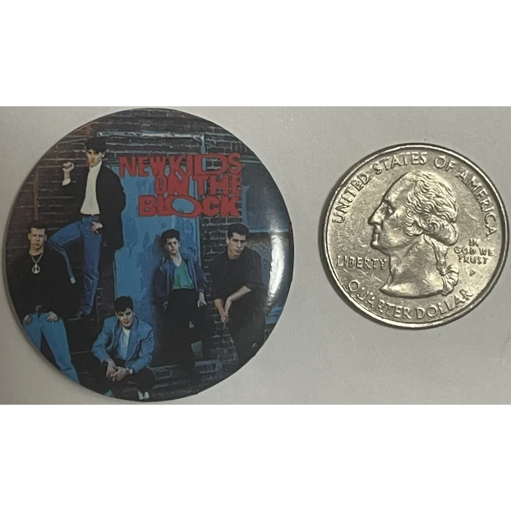 Circular pin showcasing New Kids on the Block album art, celebrating iconic boy band legacy