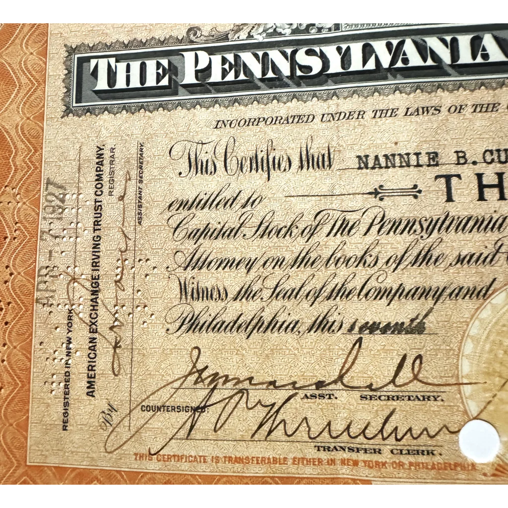 Vintage Pennsylvania Railroad stock certificate featuring ornate design from the 1950s