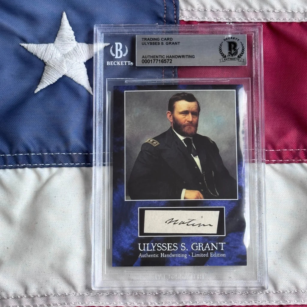 Beckett-authenticated Ulysses S. Grant handwriting trading card with portrait and signature displayed on American flag background.