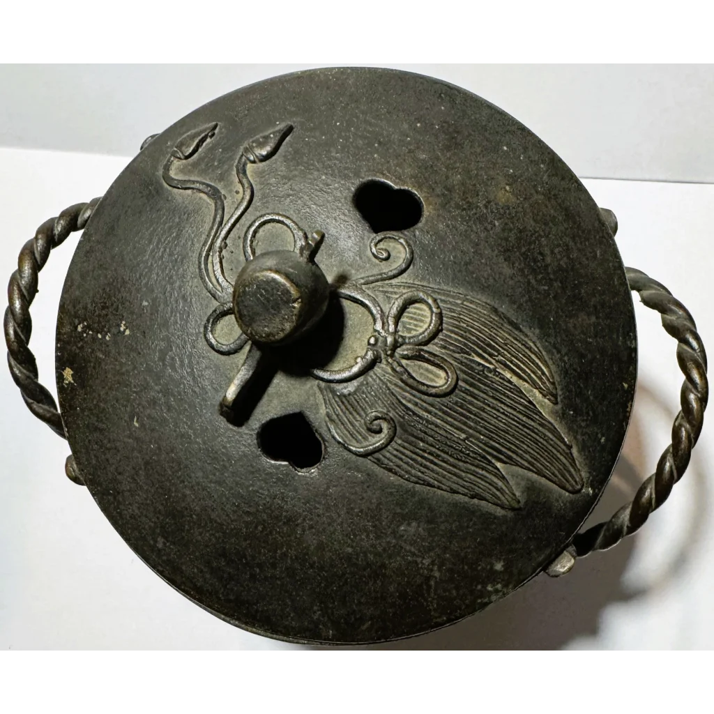 Rare Qing Dynasty handmade bronze censer with ornate lid and twisted handles