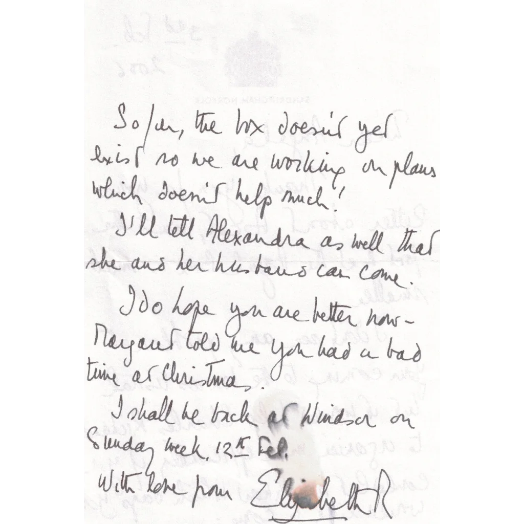 Handwritten Queen Elizabeth II words on white paper from British monarch memorabilia