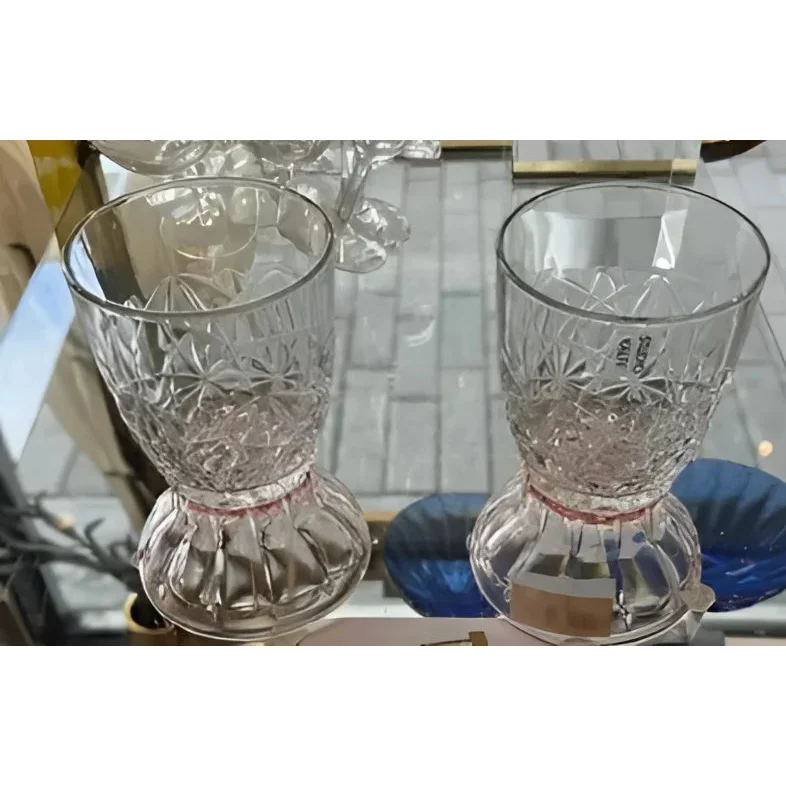 Two clear patterned Roos Kalff crystal glasses with flared bases from Rare Roos Kalff set