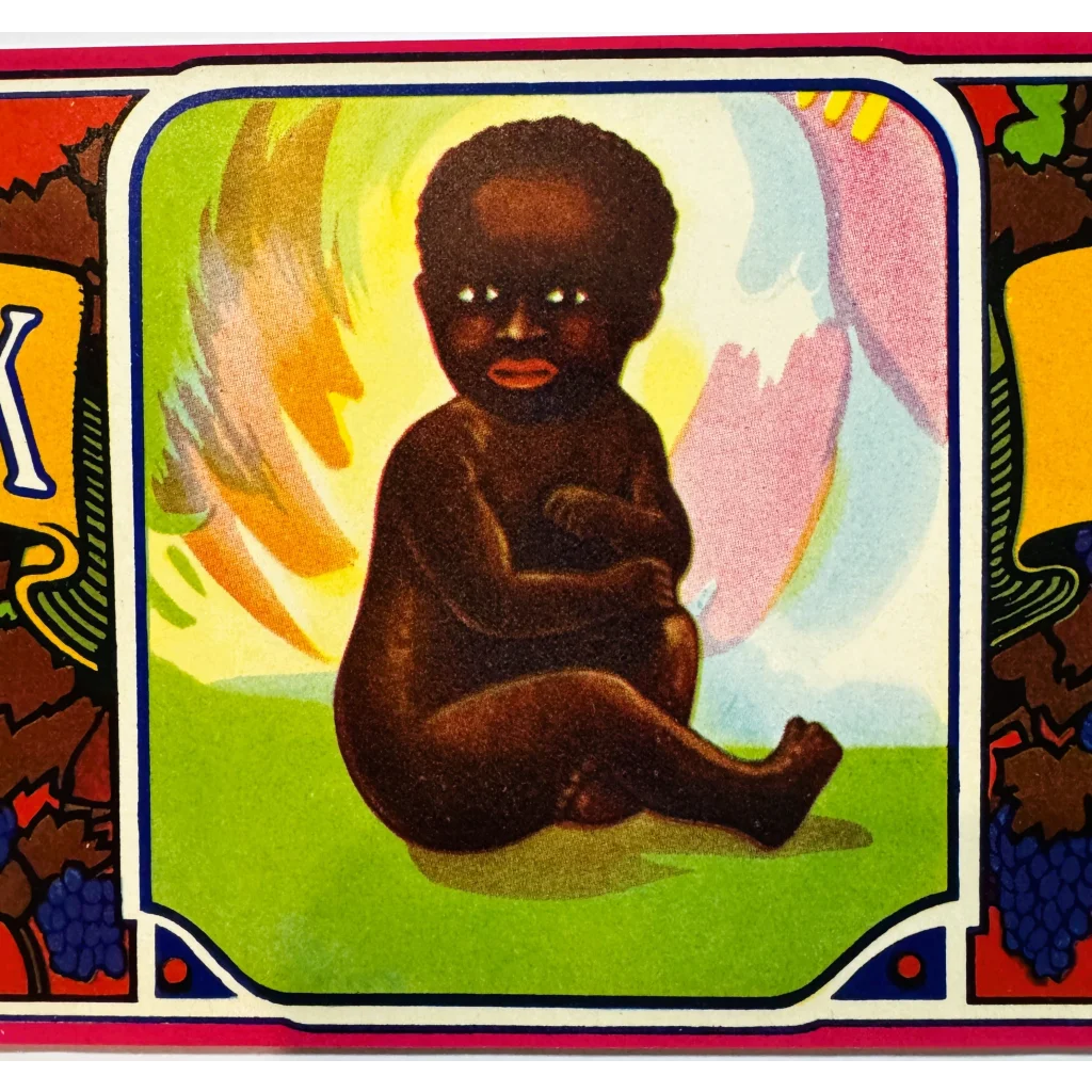 Rare Victor Fruit Growers Zinfandel crate label with racist caricature of a dark-skinned baby