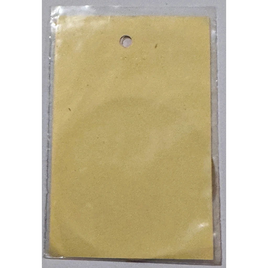Yellow card in plastic packaging with hole from rare vintage 1960s Embla Crest Daughters of the Nile decal
