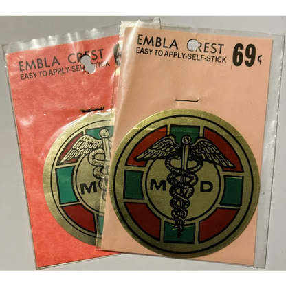 Two vintage 1960s Embla Crest MD stickers from a rare vintage 1960s doctor decal