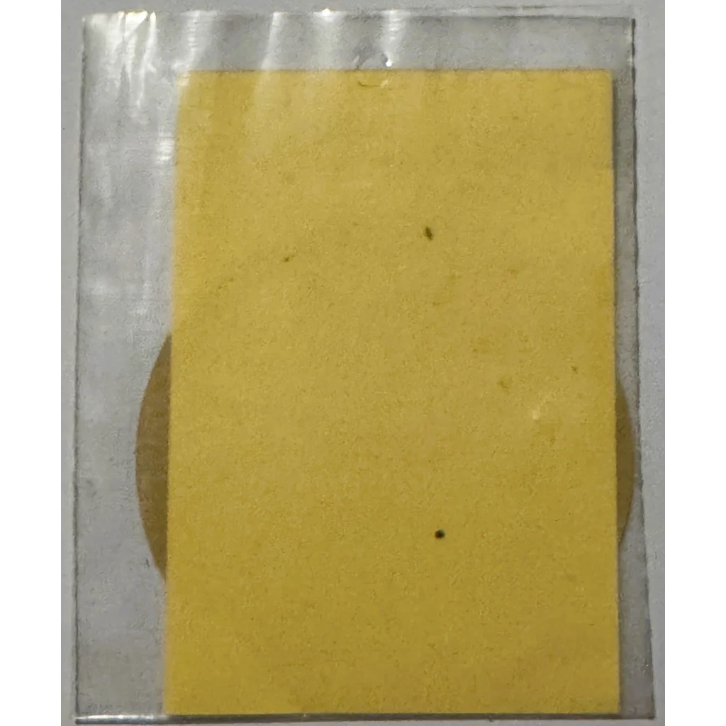 Yellow sponge in plastic wrap from rare vintage 1960s medical caduceus sticker collection