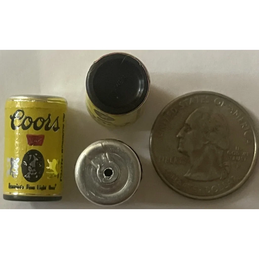 Miniature replica of a vintage 1970s Coors beer can collectible treasure