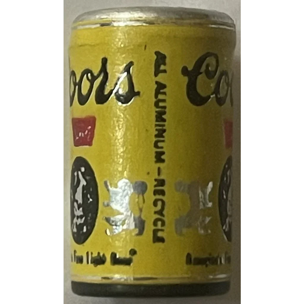 Yellow Coors can from the 1970s, perfect for vintage collectors and antique gifts