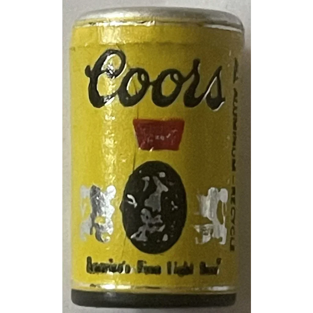 Yellow Coors beer can with vintage 1970s branding perfect for antique gifts