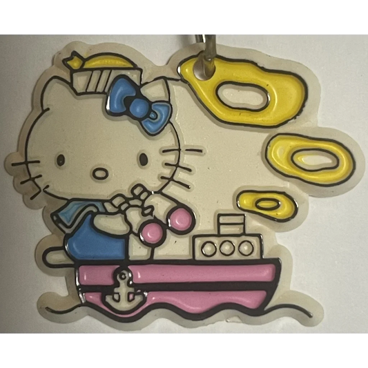 Hello Kitty on a pink boat with yellow bubbles for the Blue Bow Keychain antique gift