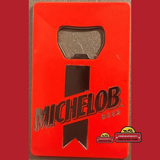 Bright red vintage Michelob beer opener with logo, a collector’s thrill from the 90s