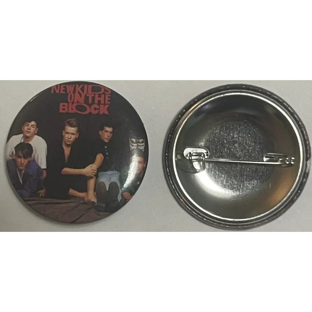 Circular vintage NKOTB pin showcasing the iconic band photo capturing ’80s music vibes