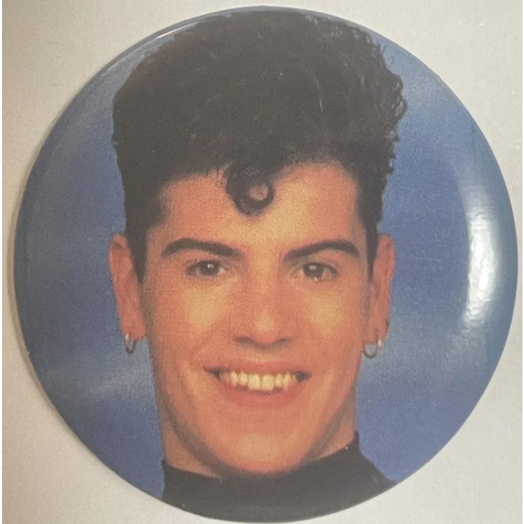 Circular vintage NKOTB pin featuring a smiling Jordan Knight close-up