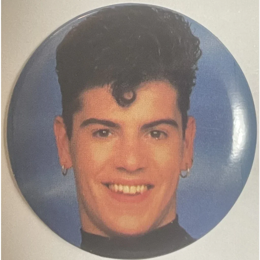 Circular vintage NKOTB pin featuring a smiling Jordan Knight close-up