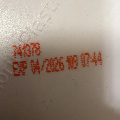 Raw Nutrition Essential pre workout powder Sour Watermelon back with white container red markings