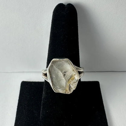 Silver raw quartz ring with large clear stone and geometric band