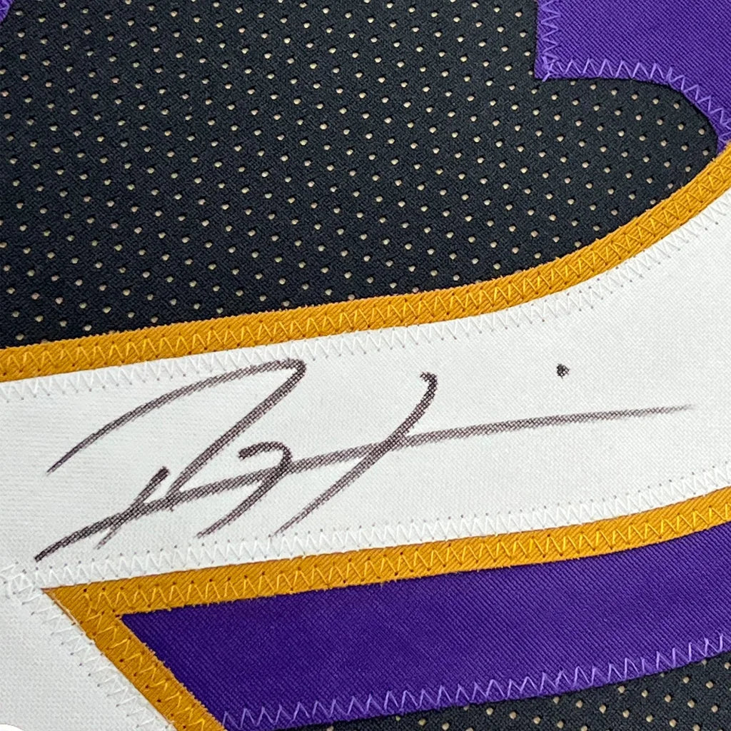 Autographed black purple gold Ravens jersey with perforated texture ready to hang on your wall