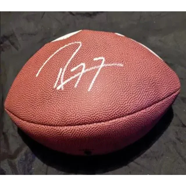 Autographed brown leather American football with Ray Lewis signed team logo design