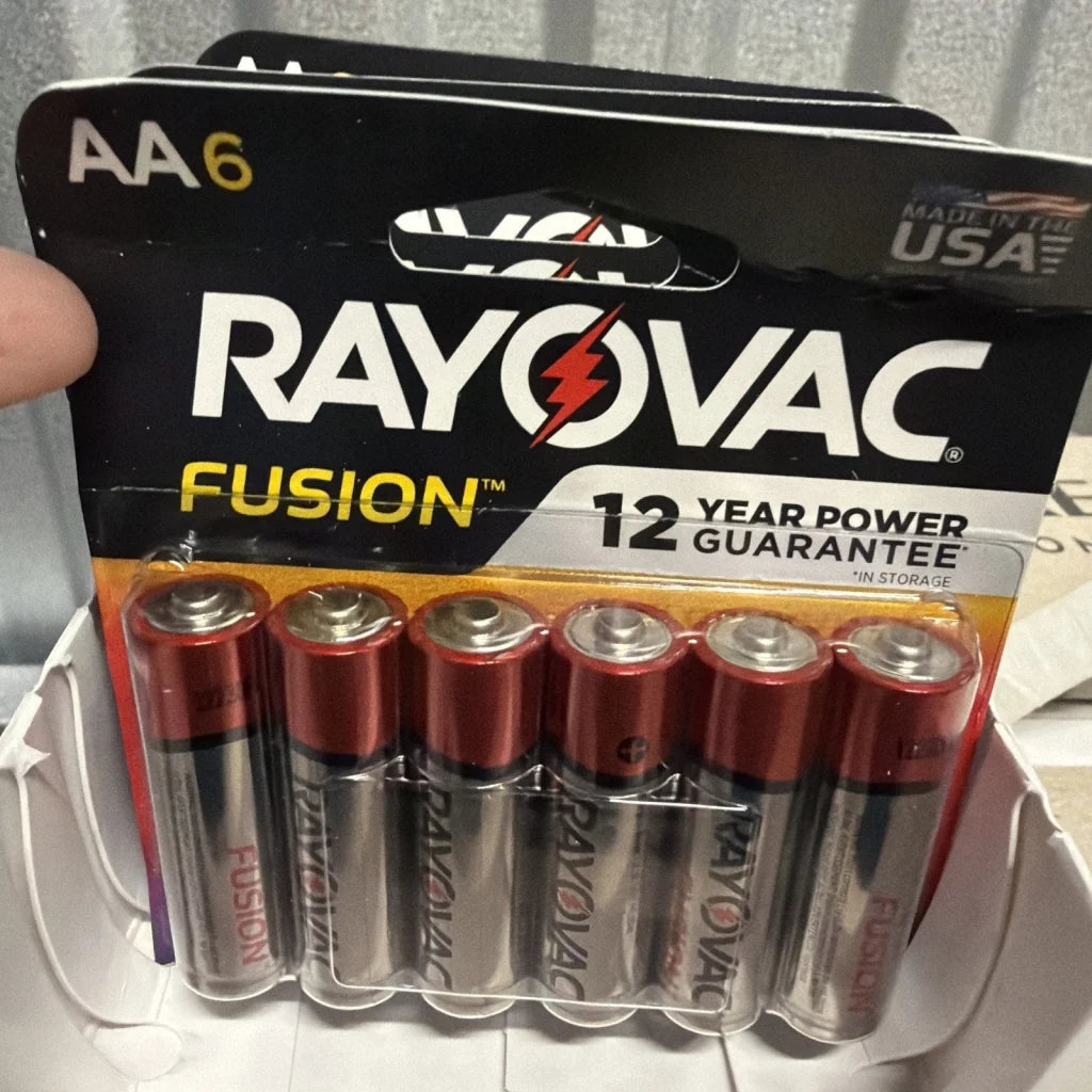 Rayovac Fusion AA batteries in black orange pack with red caps, 12 year power guarantee